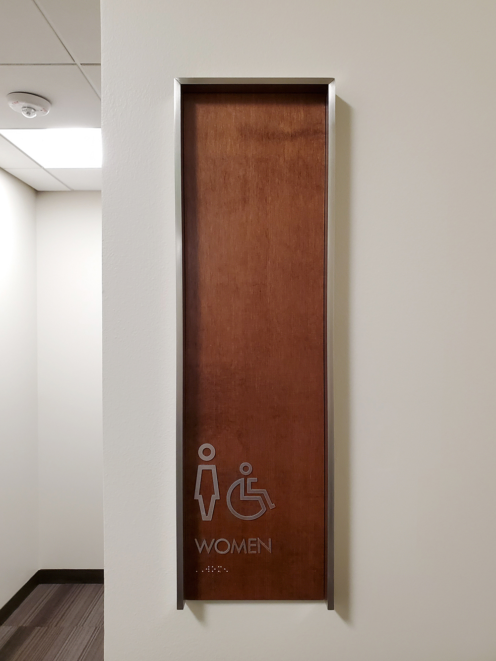 Women's public bathroom sign