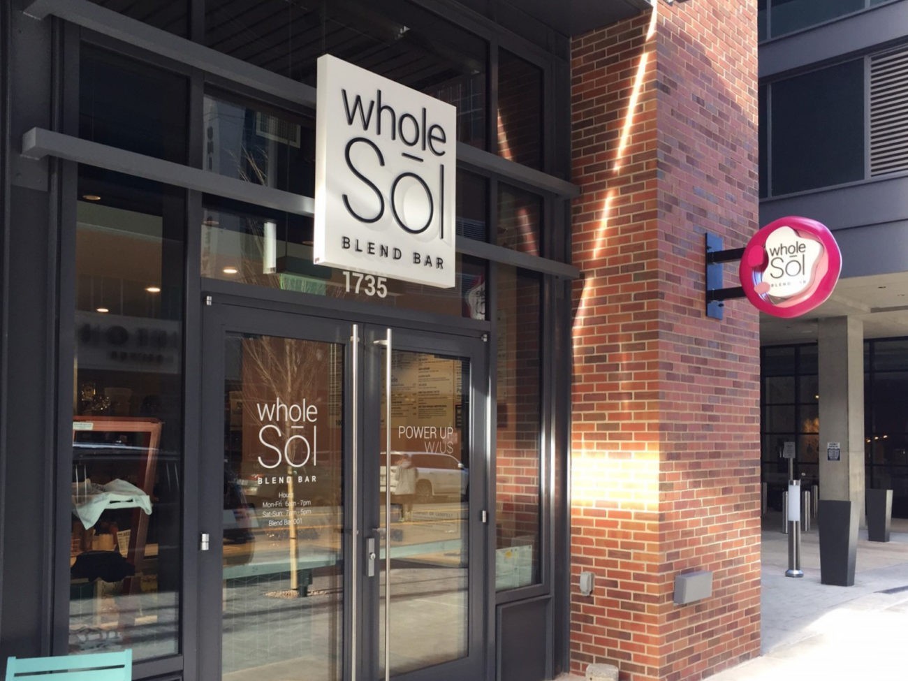 Illuminated Blade Sign For A Classic Storefront Look