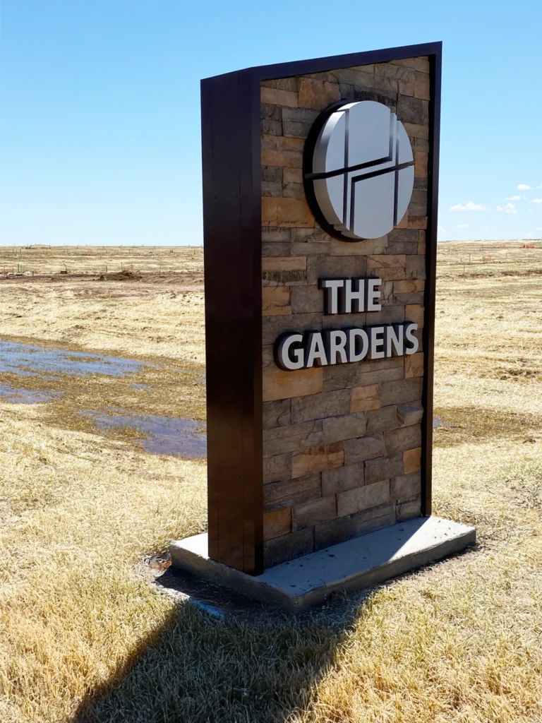 Modern property signage with clear branding, readable typography, and professional design elements for maximum visibility.