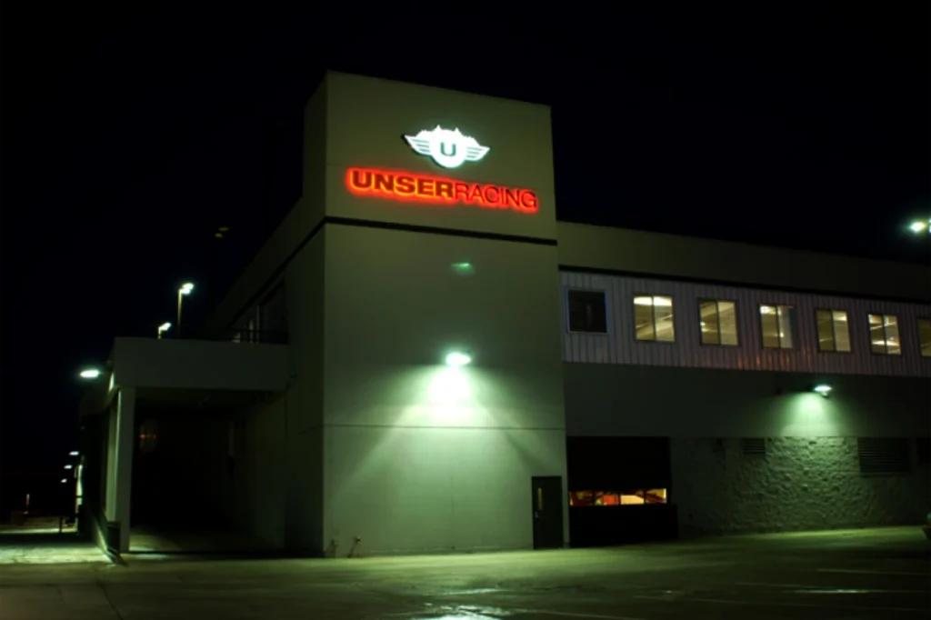 Illuminated Channel letters sign on a storefront, customized with bold fonts and brand colors to enhance visibility and business identity